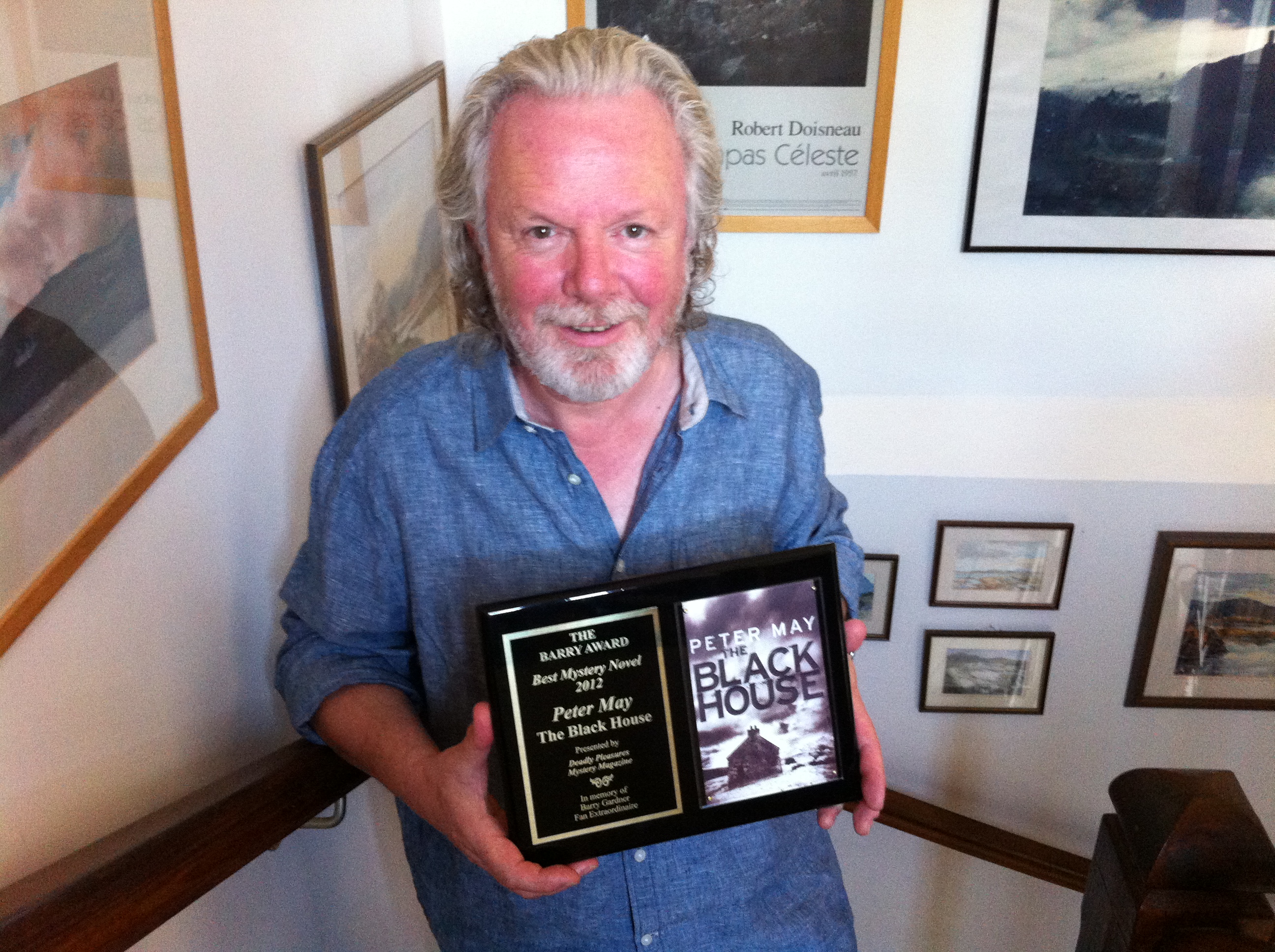 Peter May with the Barry Award for Best Crime
                  Novel in the US, 2013